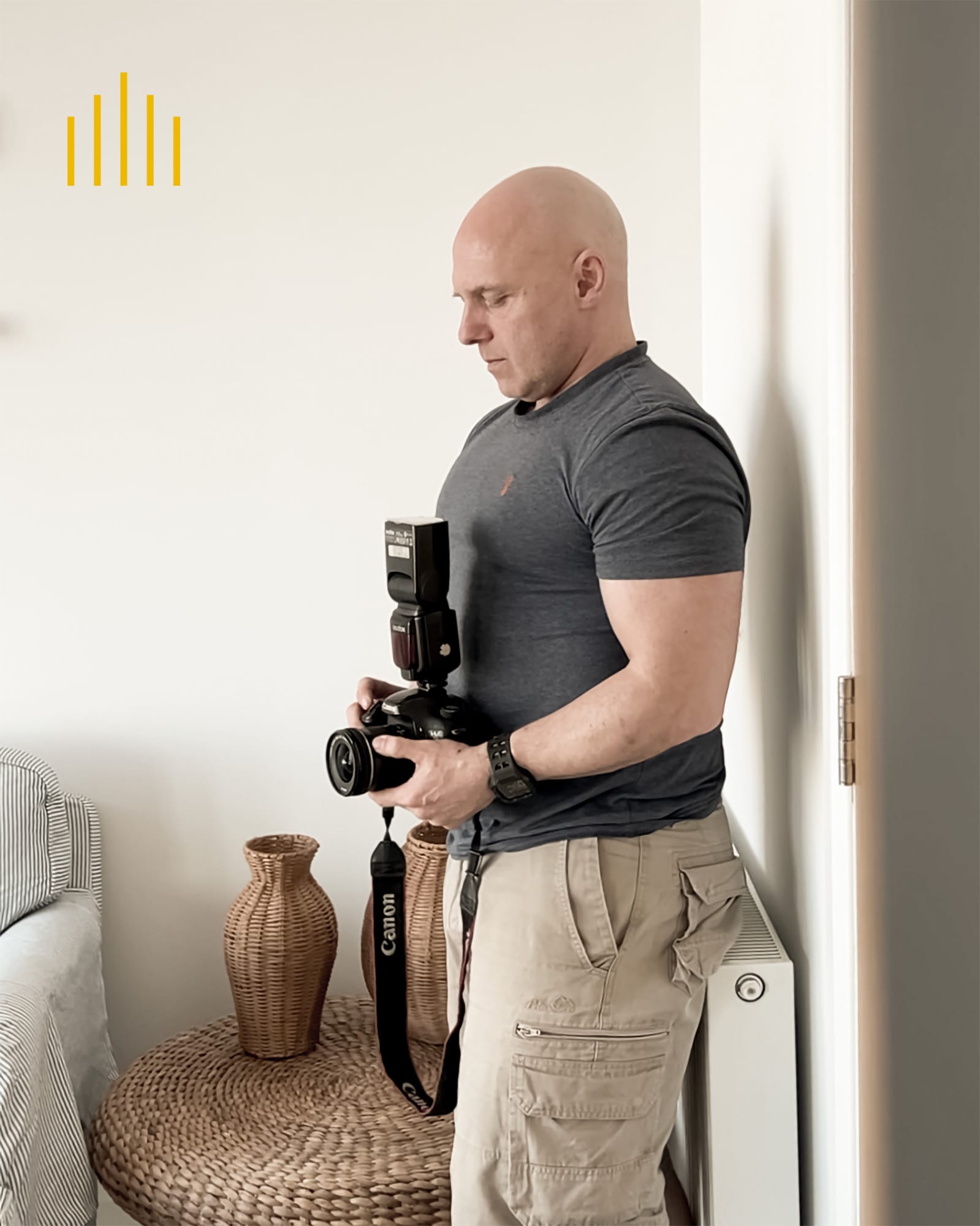 Nathan photographing a property interior