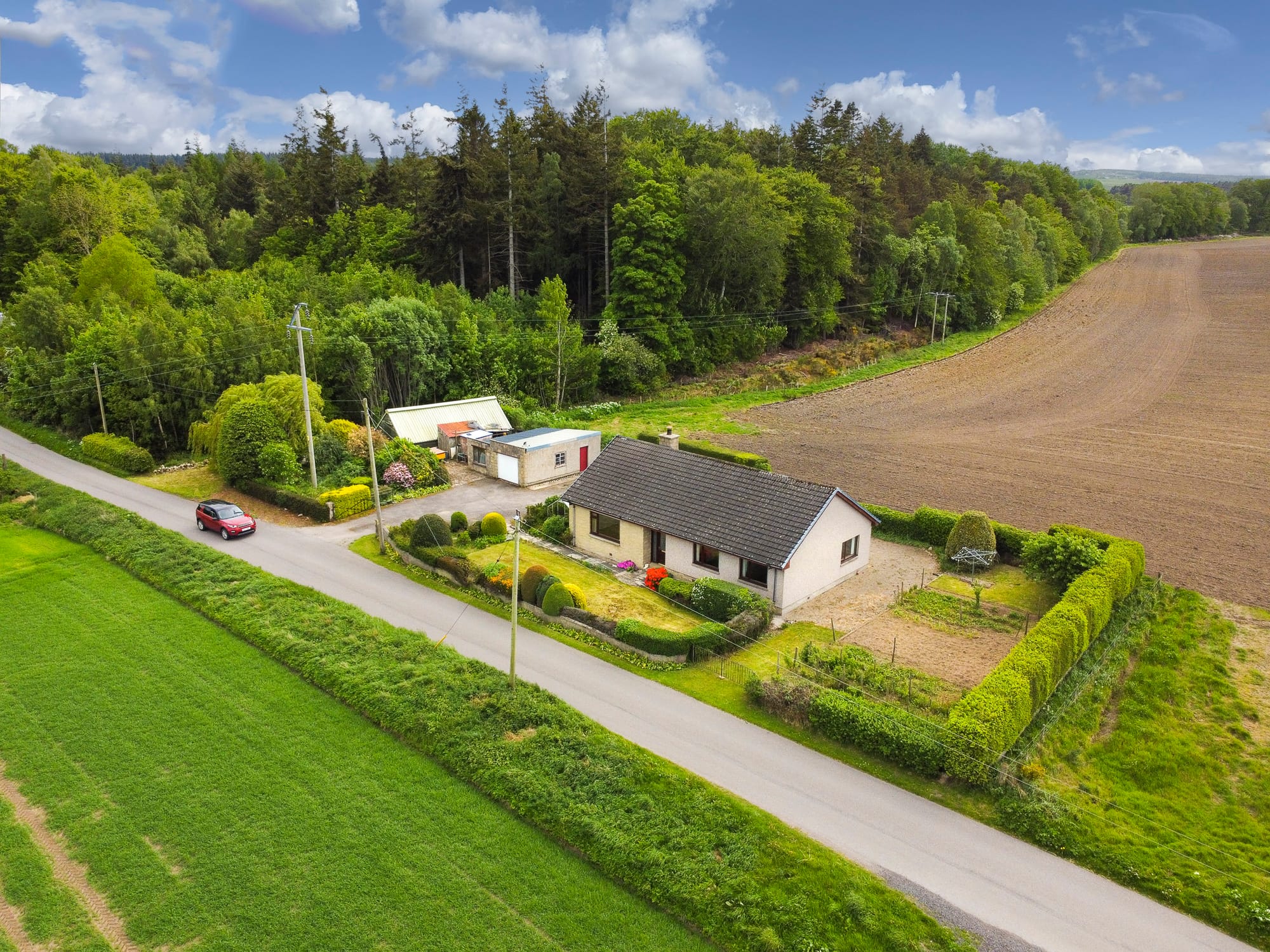 Aerial view of the property and its setting