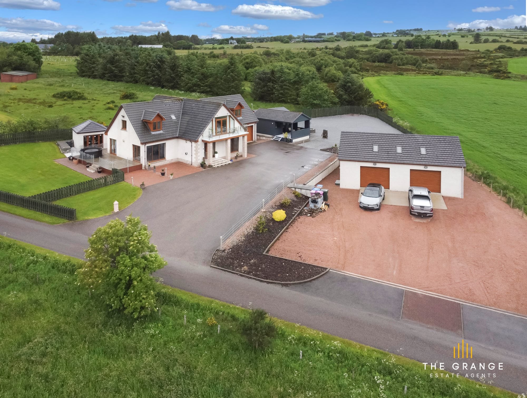Aerial view of the property and surrounding farmland