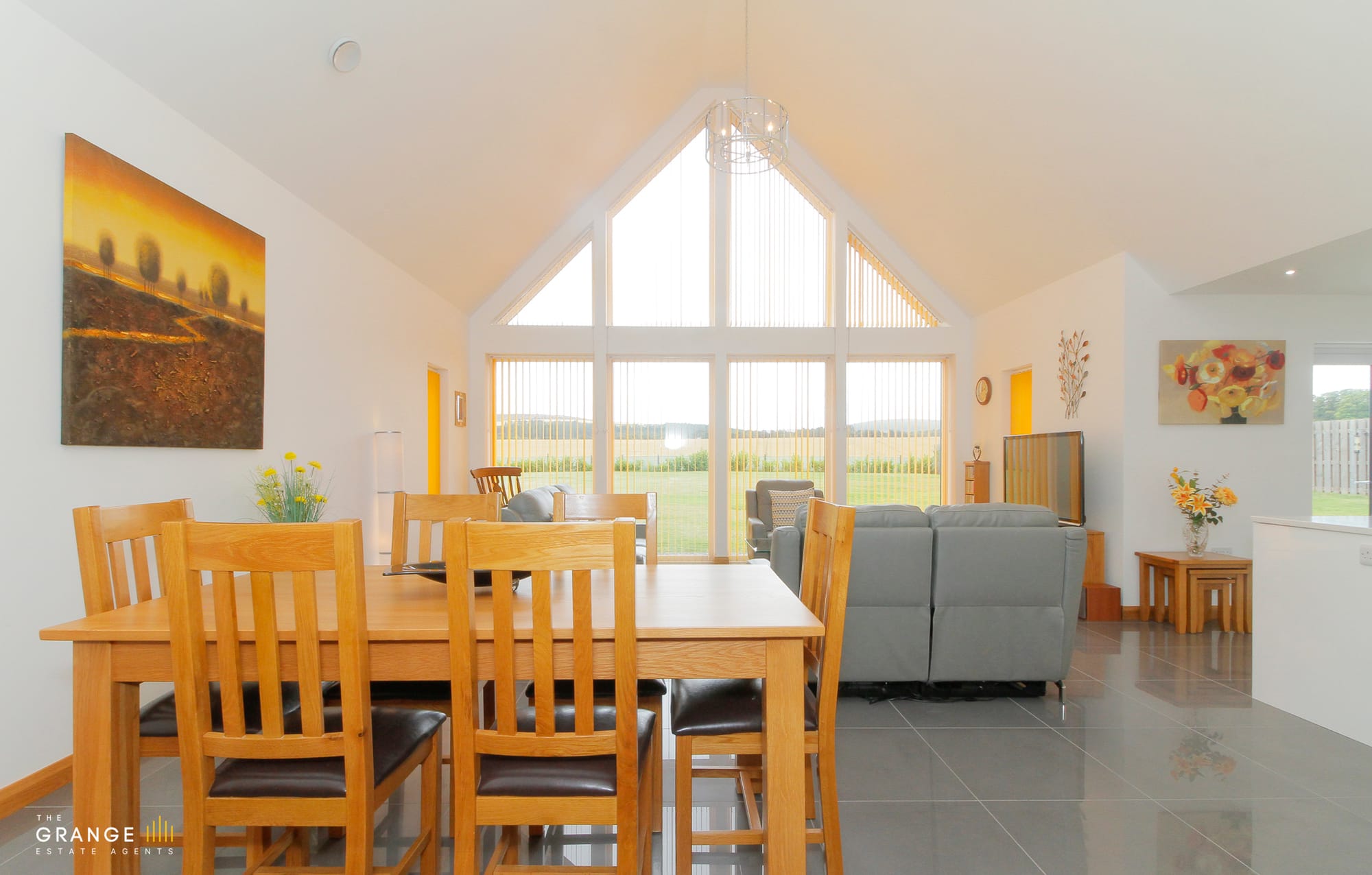 Dining space with floor to ceiling glazing