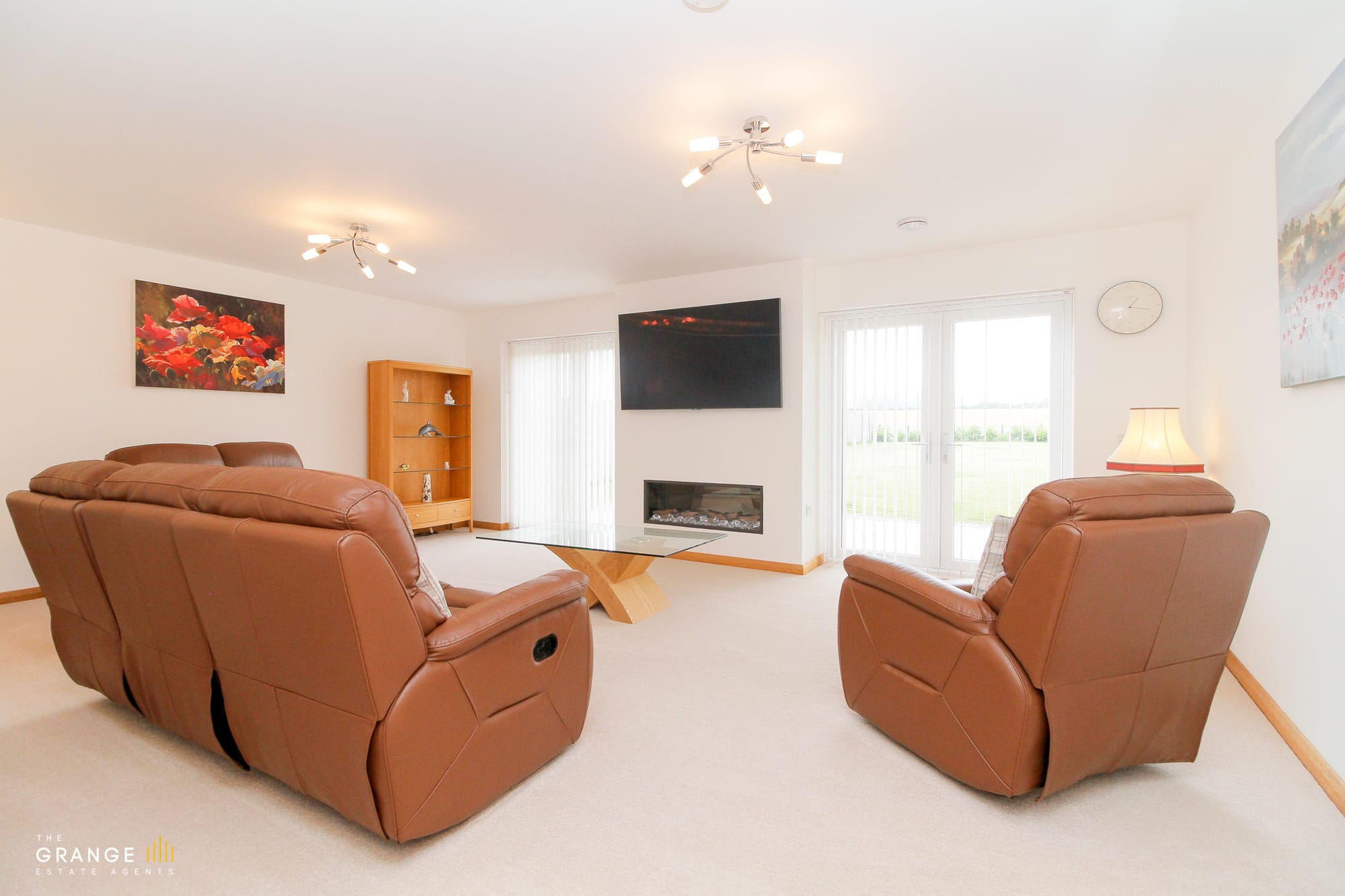 Second lounge with feature fireplace