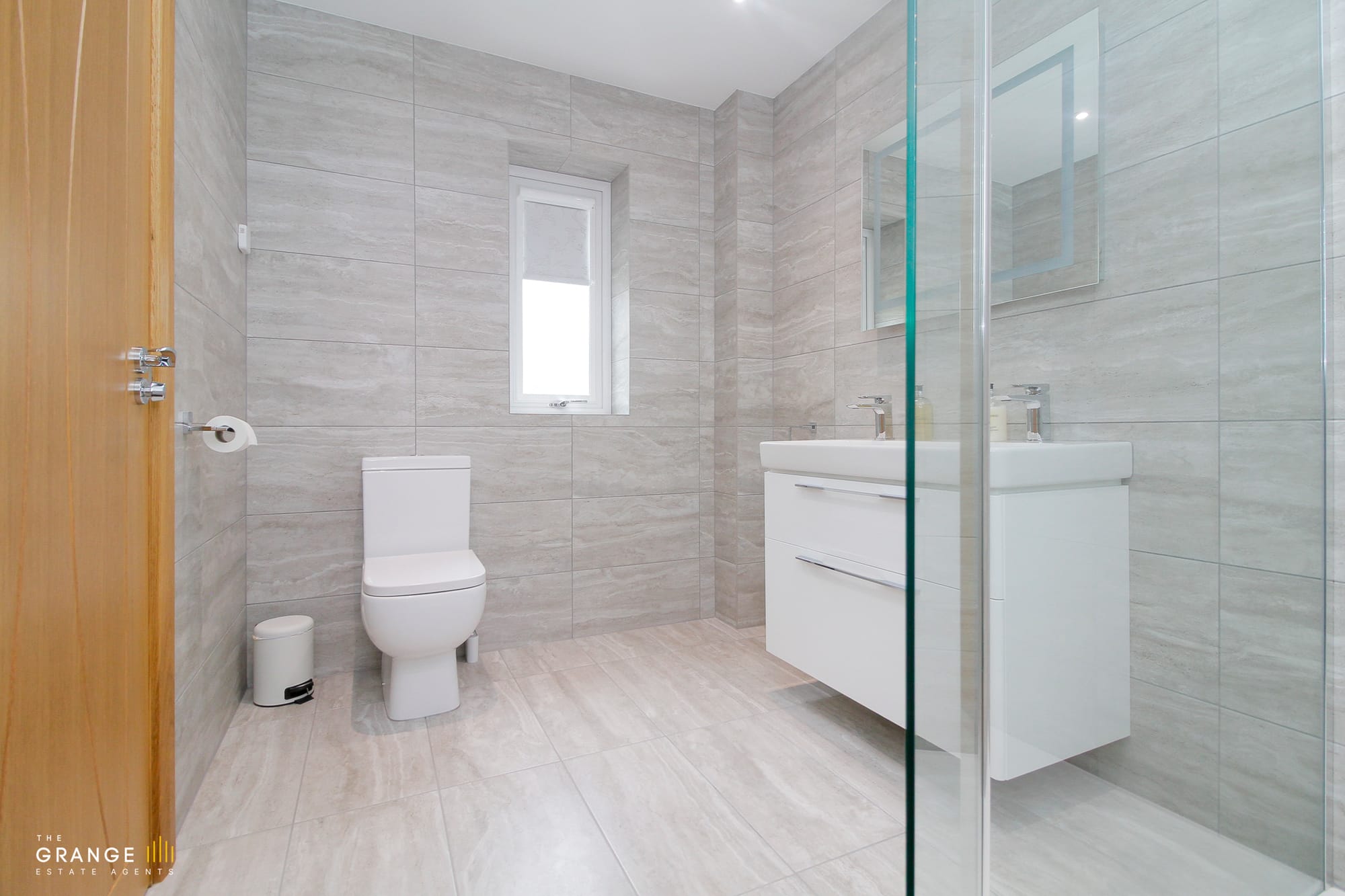 En-suite with walk-in glass shower