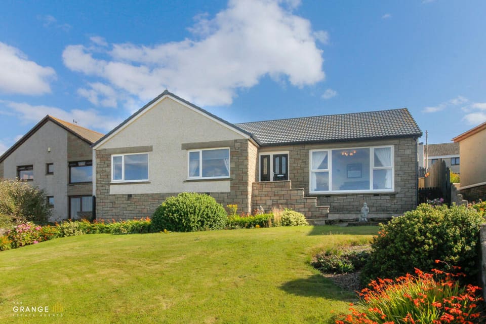 The bungalow and front garden
