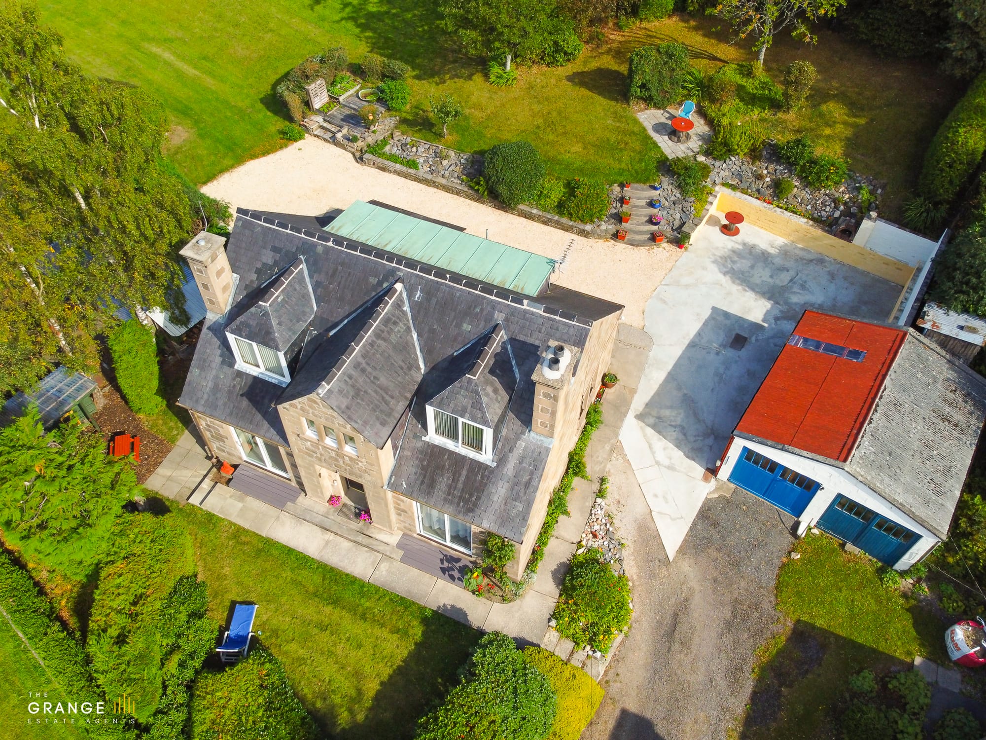 Aerial view of the property and grounds